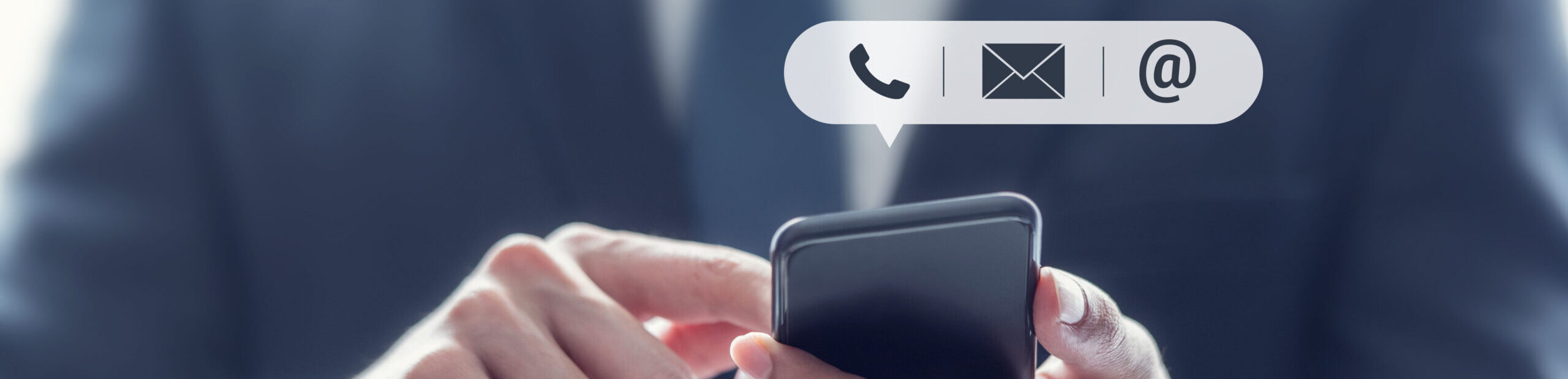 CONTACT US, Hand of Businessman holding mobile smartphone with (