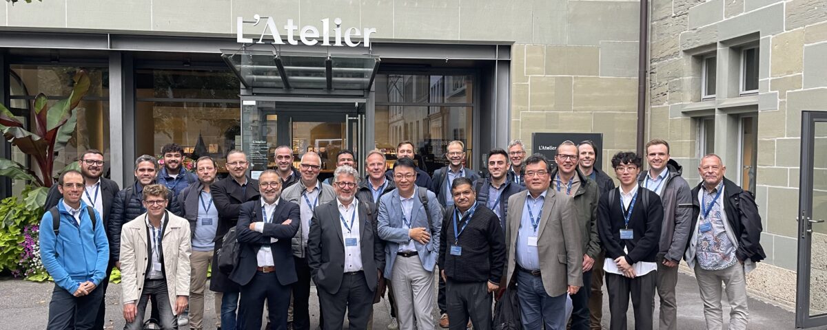 Group photo of participants at the MCm Sales Partners Meeting 2025 in Fribourg, Switzerland, celebrating global collaboration and innovation.