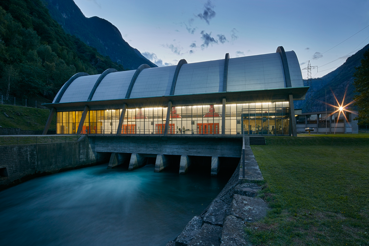 Nuova Biaschina Hydro Power Plant at dusk, showcasing its modernized infrastructure and sustainable energy production in Ticino, Switzerland.